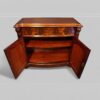 Victorian mahogany serpentine chiffonier interior of cupboard