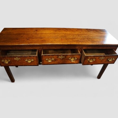 Antique oak dresser base drawers open