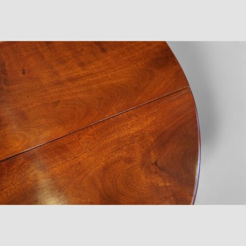 George II mahogany drop flap table top detail