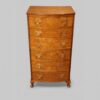 George VI walnut bow front chest