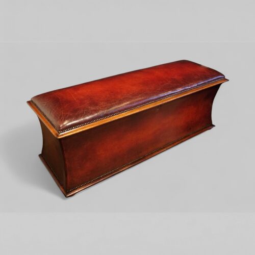 Large Victorian leather ottoman angle view