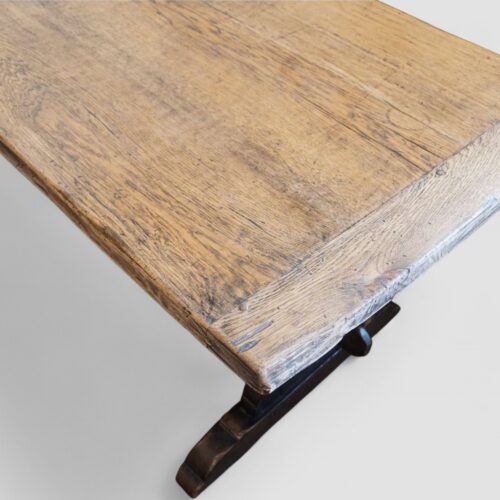 Close-up of wood grain and joinery on antique refectory table