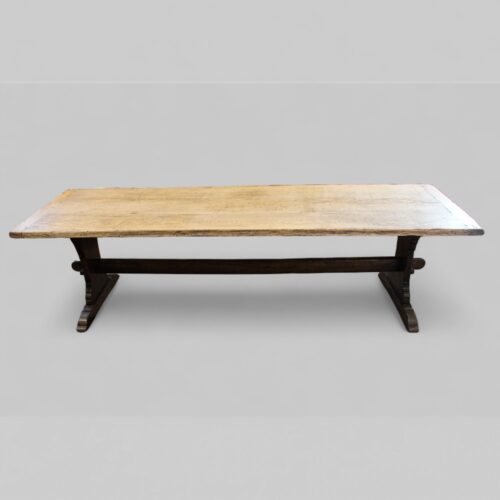 Side view of large oak table showing slab-end supports