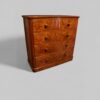 Victorian burr walnut chest of drawers at angle