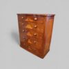 Victorian mahogany chest of drawers with flame veneer and panel sides