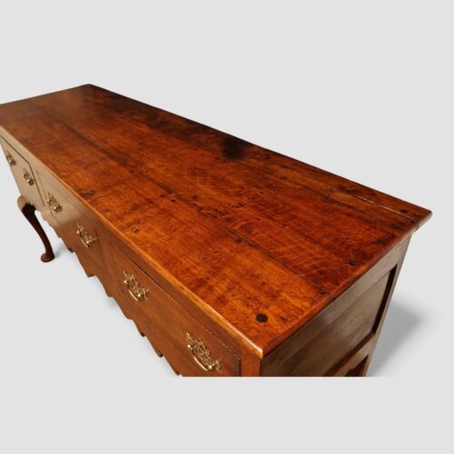 Antique oak cabriole leg dresser base top angle view