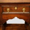 Antique oak pot board dresser with brass drop handles centre drawer
