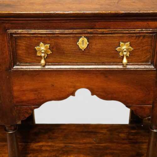 Antique oak pot board dresser with brass drop handles centre drawer