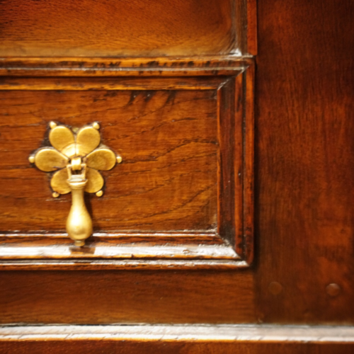 Antique oak pot board dresser with brass drop handles detail