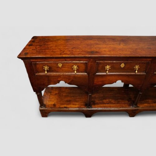 Antique oak pot board dresser with brass drop handles drawers