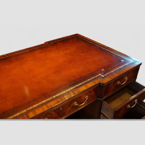 Edwardian mahogany partners desk leather top detail