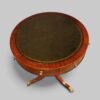 Small mahogany drum table leather top