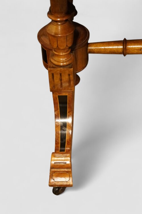 Victorian walnut and ebony coffee table leg detail