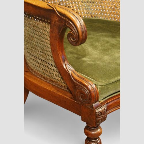 William IV mahogany bergere library chair scroll handgrip
