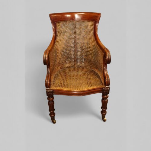 William IV mahogany bergere library chair without cushions