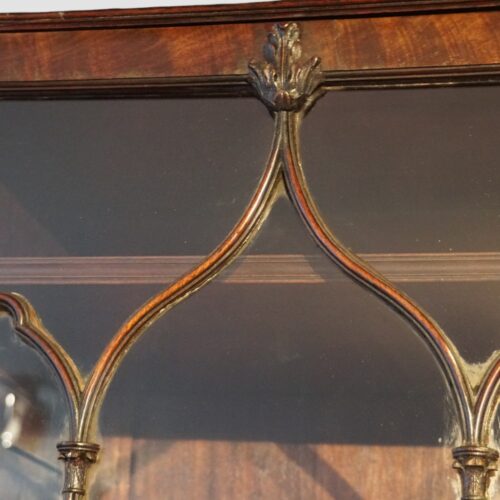 George III mahogany breakfront bookcase leaf carving