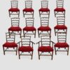 Set of 12 Hepplewhite style ladderback dining chairs