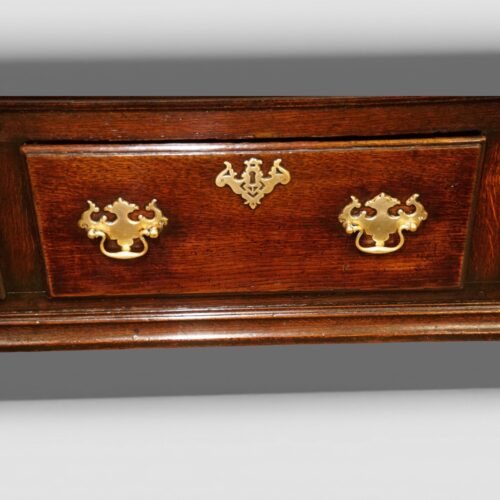Antique oak cabriole leg dresser drawer detail