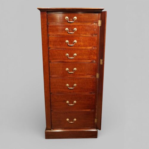 Edwardian fiddleback mahogany Wellington chest