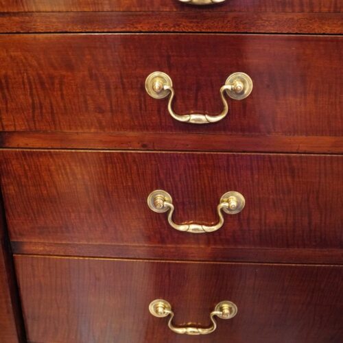 Edwardian fiddleback mahogany Wellington chest handles
