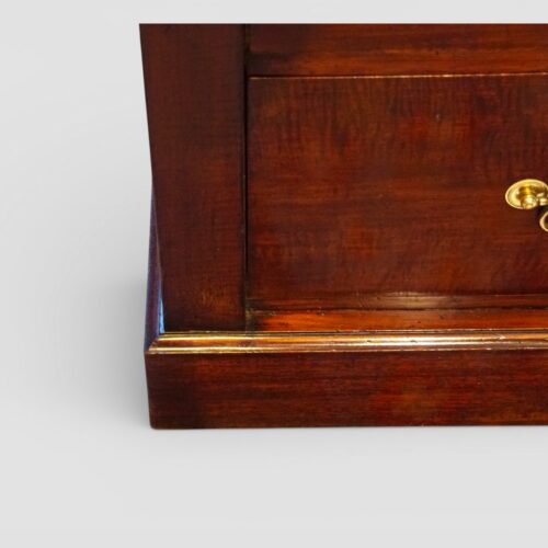 Edwardian fiddleback mahogany Wellington chest plinth