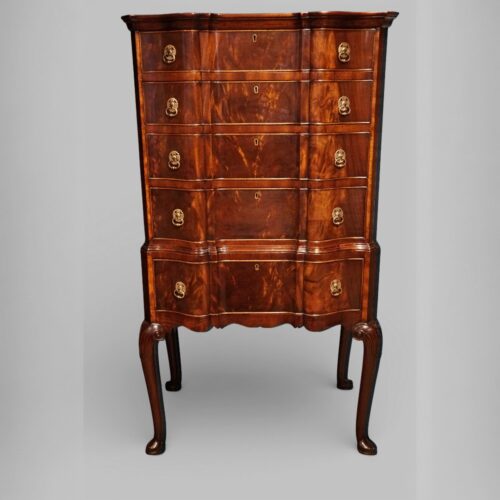 George I style serpentine mahogany chest on stand