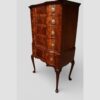 George I style serpentine mahogany chest on stand angle view