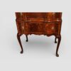 George I style serpentine mahogany chest on stand base detail