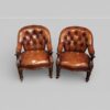 Pair of Victoran button back open arm chairs