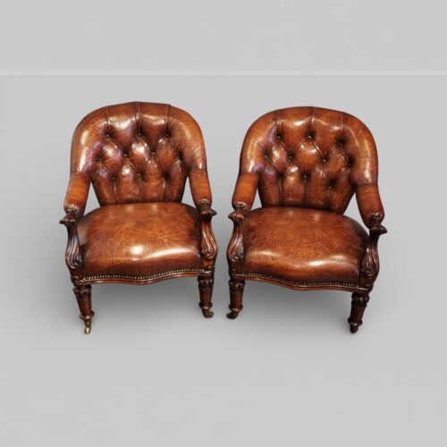 Pair of Victoran button back open arm chairs
