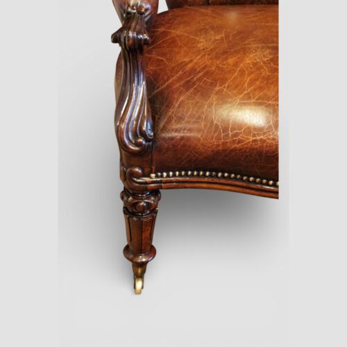 Pair of Victoran button back open arm chairs front leg and arm