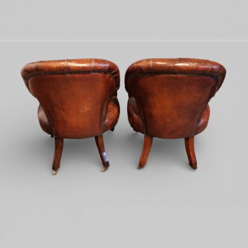 Pair of Victoran button back open arm chairs rear