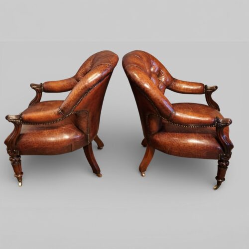 Pair of Victoran button back open arm chairs side
