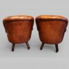 Pair of Victorian button leather reading chairs rear