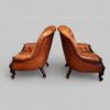 Pair of Victorian button leather reading chairs side