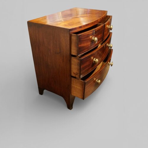 Regency mahogany bow front chest small size drawers open