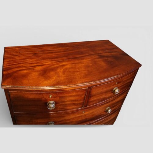Regency mahogany small bow front chest top