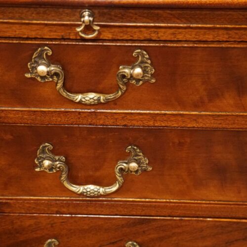 Small 19thc mahogany brushing slide chest handles