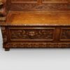 Victorian carved oak settle carved lion head panel
