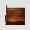 Victorian carved oak settle end detail
