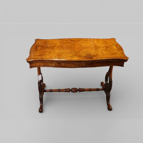 Victorian walnut serpentine card table front on