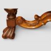 Pair of Edwardian leather wing back chairs carved leaf