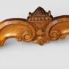 Pair of Edwardian leather wing back chairs stretcher carved urn detail