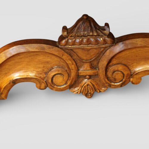 Pair of Edwardian leather wing back chairs stretcher carved urn detail