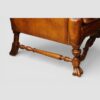 Pair of Edwardian leather wing back chairs turned walnut side rail