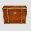 Antique brass bound teak trunk front