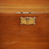 Antique brass bound teak trunk lockplate
