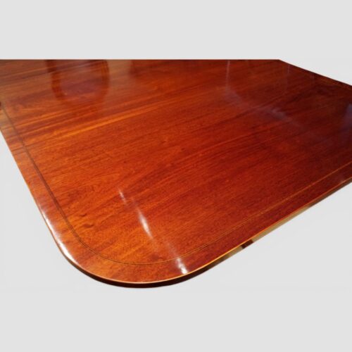 Georgian style inlaid mahogany twin pillar dining table inlay top