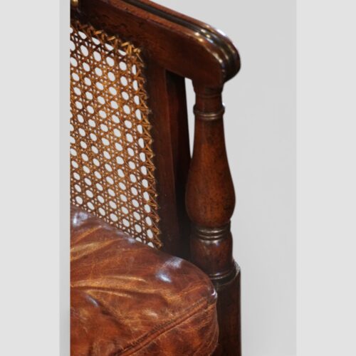 Regency mahogany bergere chair turning