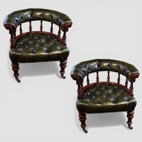 Pair of Victorian green leather tub chairs